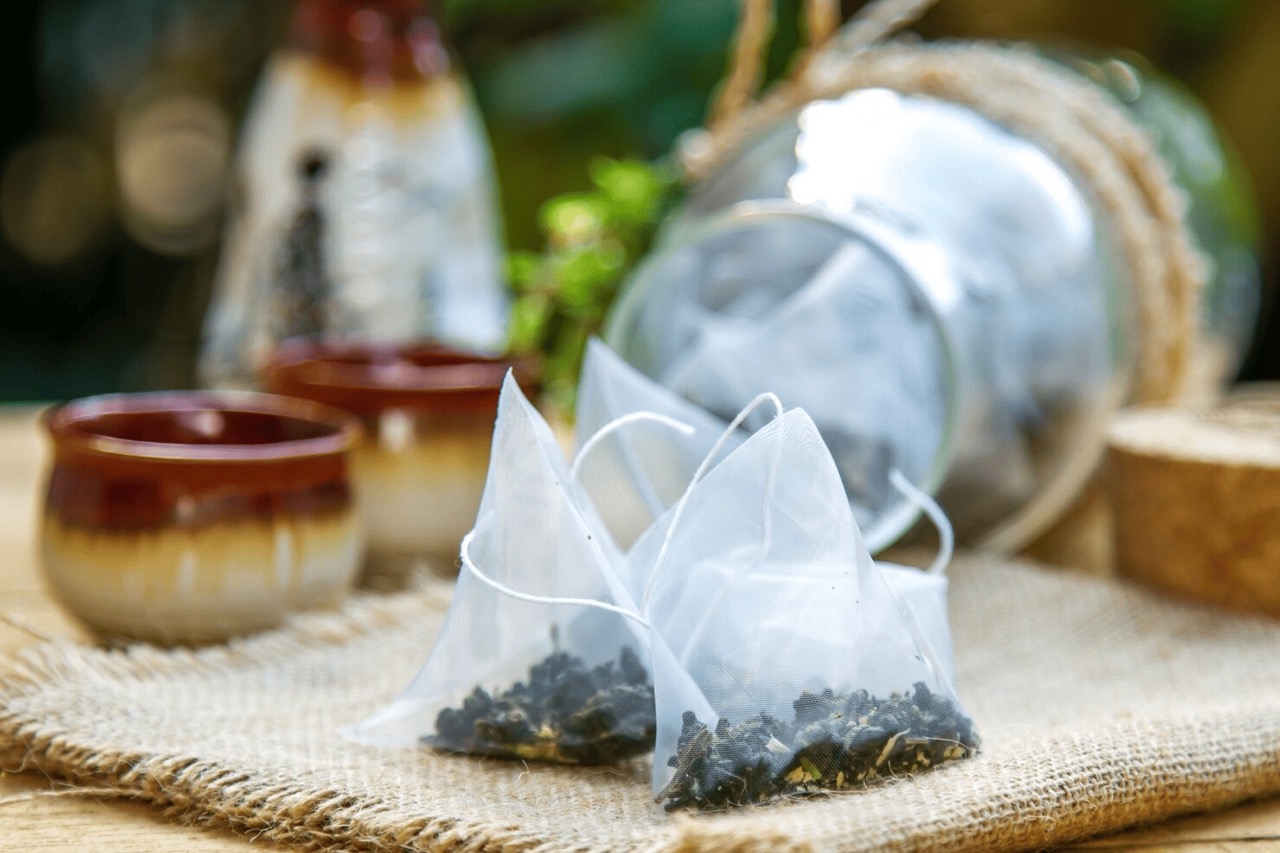 An image showing tea bag and tea pots.